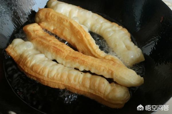 怎么炸油条怎样活炸油条的面视频炸油条