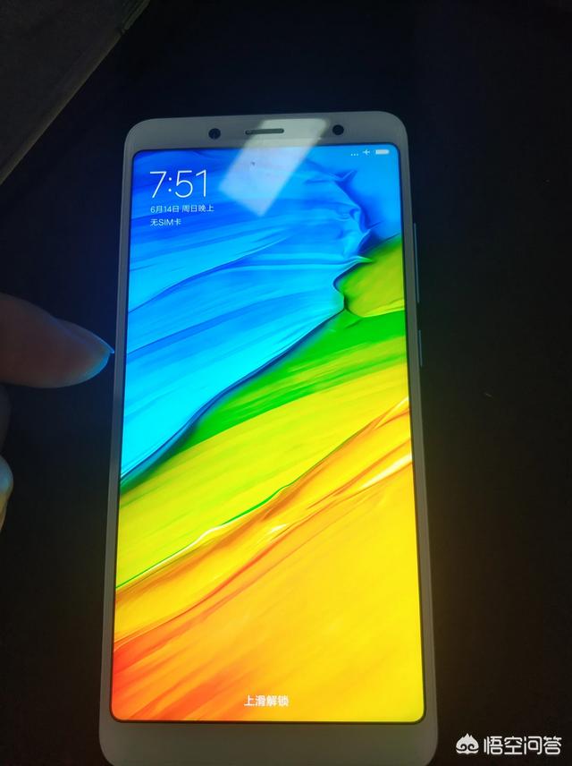 头条问答 - 新买的红米note5的屏幕上显示两个机器人,是什么原因?