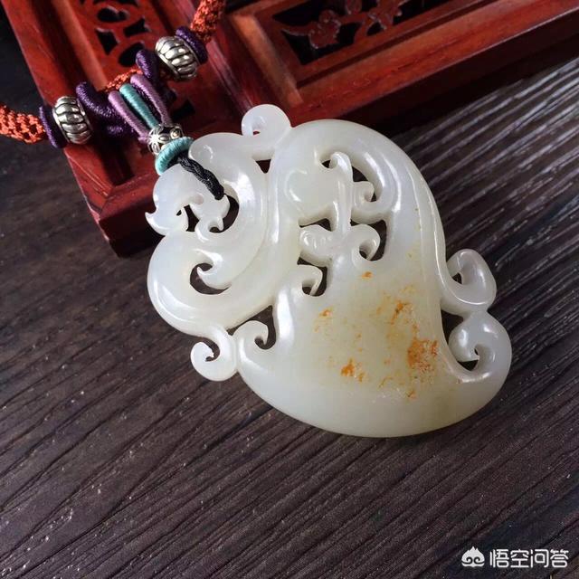 和田玉假皮的特征图片,在网上仅靠图片识别和田玉的真假，可靠吗？