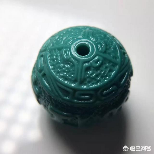 玉表面不光滑有小坑,绿松石珠子上有圆形的坑怎么回事？