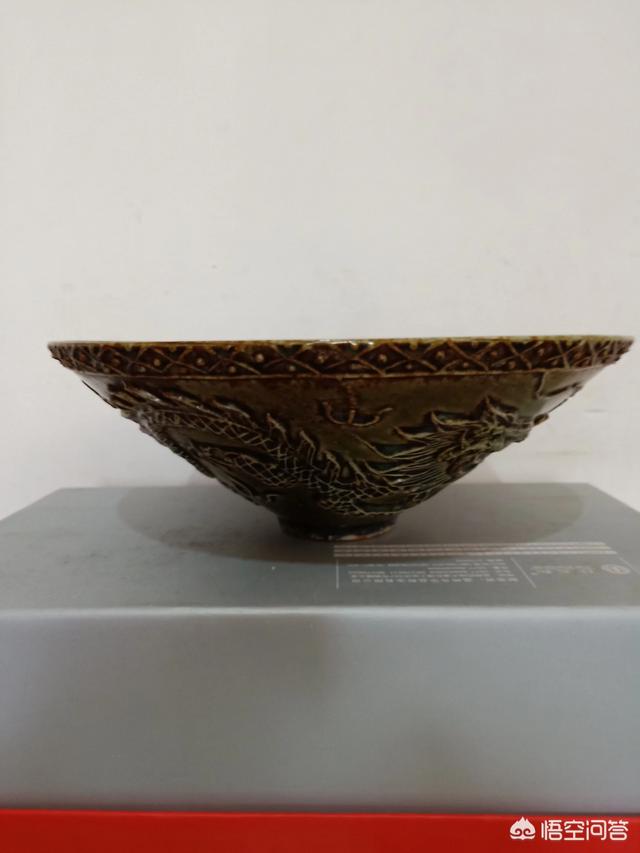 和田玉表面有麻点小坑正常吗,和田玉皮色是如何产生的？