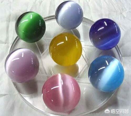 猫眼石图片大全,猫眼石和虎眼石有什么不一样？