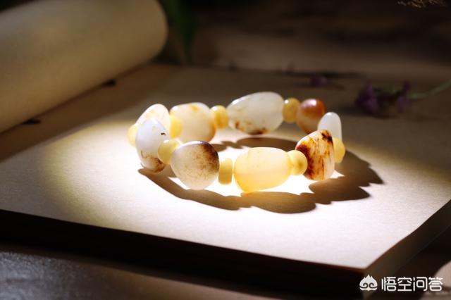 和田玉籽料颜色等级,新疆和田籽料是先看玉质，还是白度？