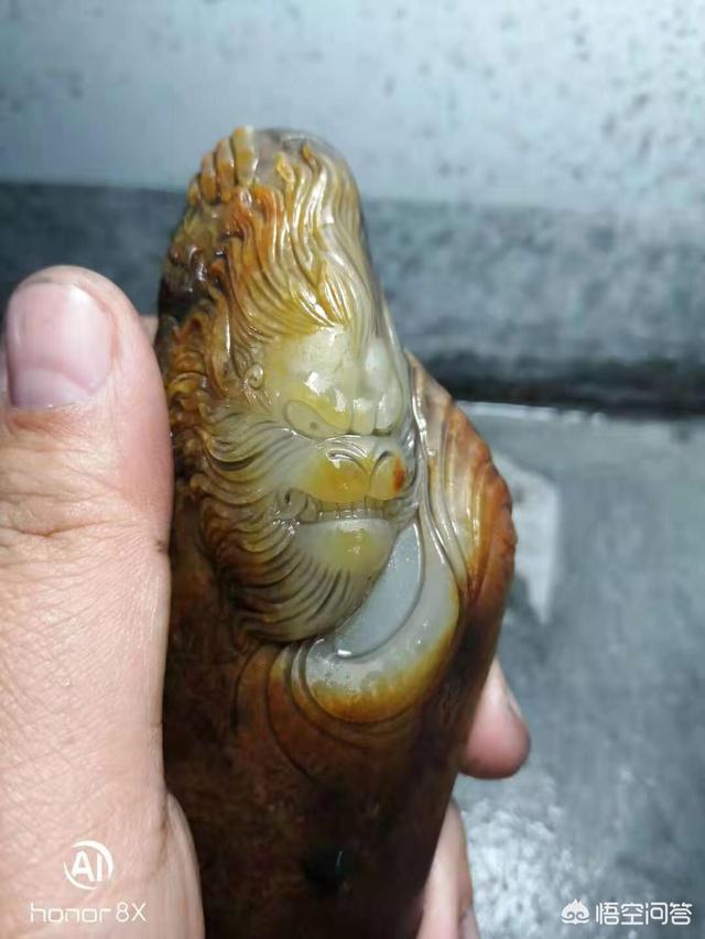 网上200多的和田玉是真的吗,淘宝店铺卖的三四十块钱的玉牌是真玉吗？