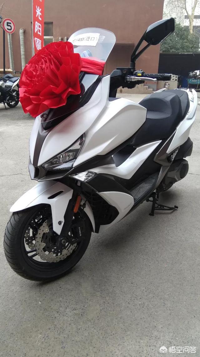 买光阳赛艇400是买国产还是进口差一万多值吗