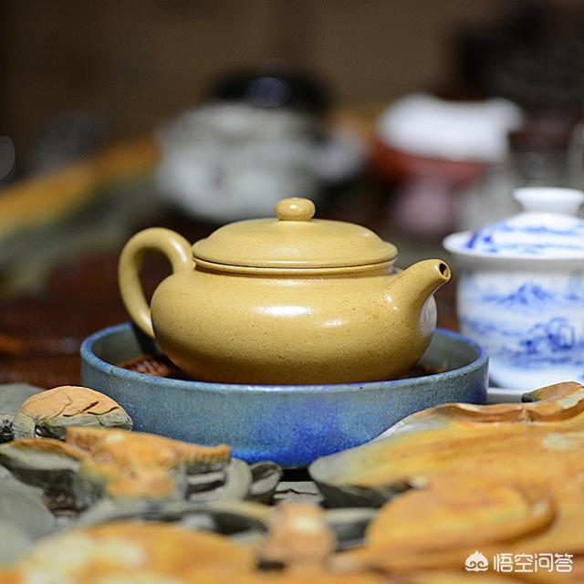 和田玉可以用茶水养吗,紫砂壶看着干涩的，是泥料不好吗？