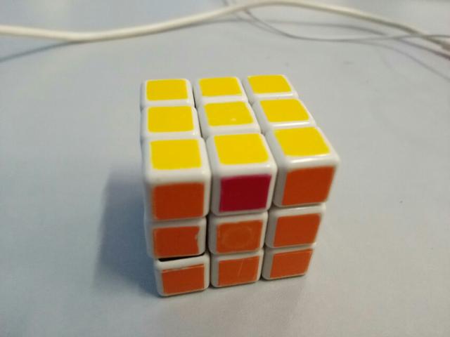 这个三阶魔方最后一步该怎么拧？