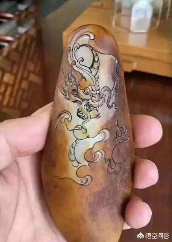 网上200多的和田玉是真的吗,淘宝店铺卖的三四十块钱的玉牌是真玉吗？