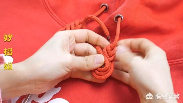 卫衣帽子的绳子打结法，卫衣上面的两根绳子是干嘛用的