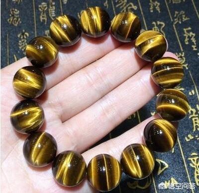 猫眼石图片大全,猫眼石和虎眼石有什么不一样？