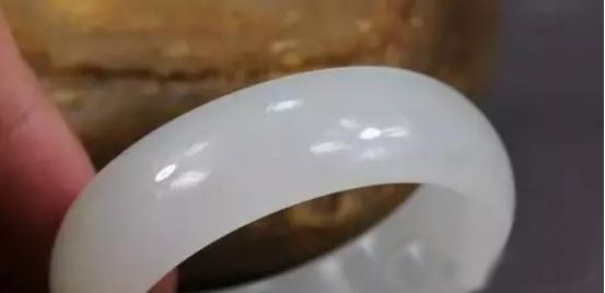 和田玉泡油能泡油润吗,和田玉黄皮籽料怎么盘玩最快变漂亮？