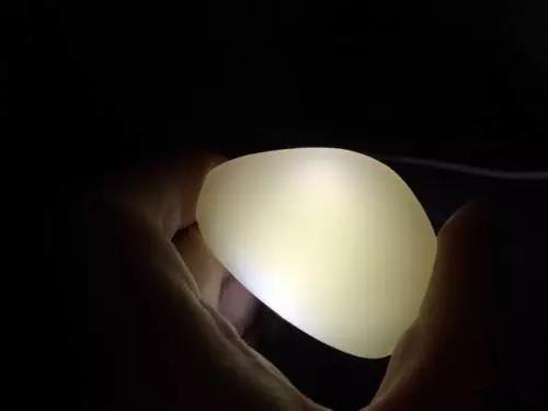 强光手电能看出和田玉的产地吗?