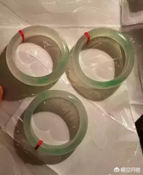 玻璃种翡翠原石打灯图片,翡翠赌石打灯很绿, 为什么切开却很渣？