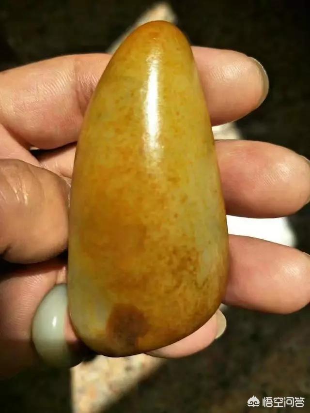 和田玉假皮的特征图片,和田玉不是籽料，但有皮色，是假的吗？