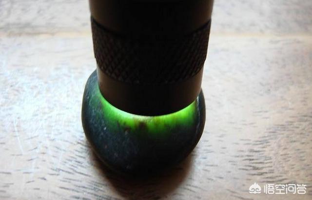 和田玉有墨玉吗,和田墨玉为什么黑色的？墨玉能否透光？