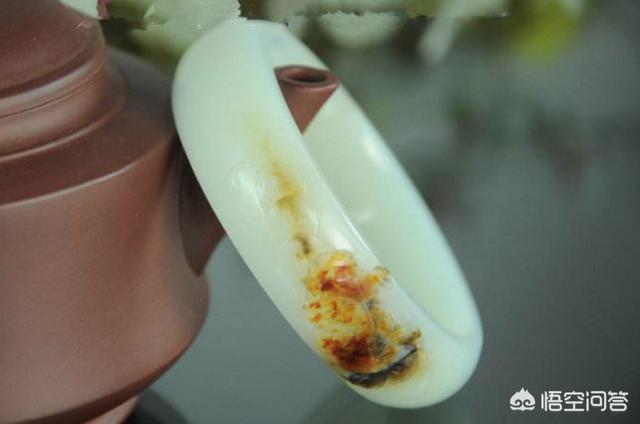 和田玉手镯70000元图片,新疆和田玉手镯，值6800元吗？