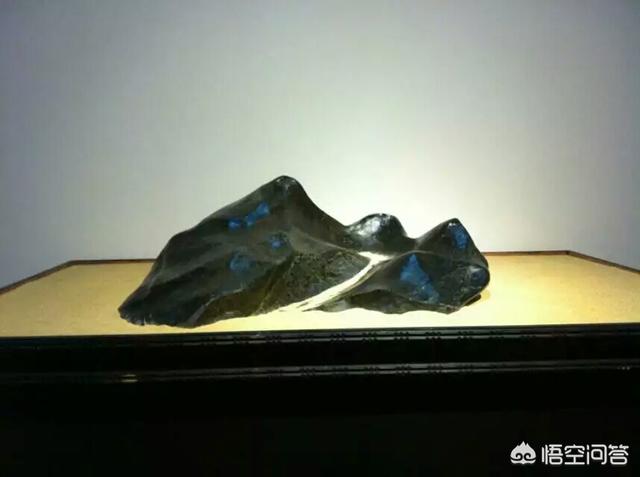 欧泊石值钱吗,这块从西藏带回来的石头有收藏价值吗？