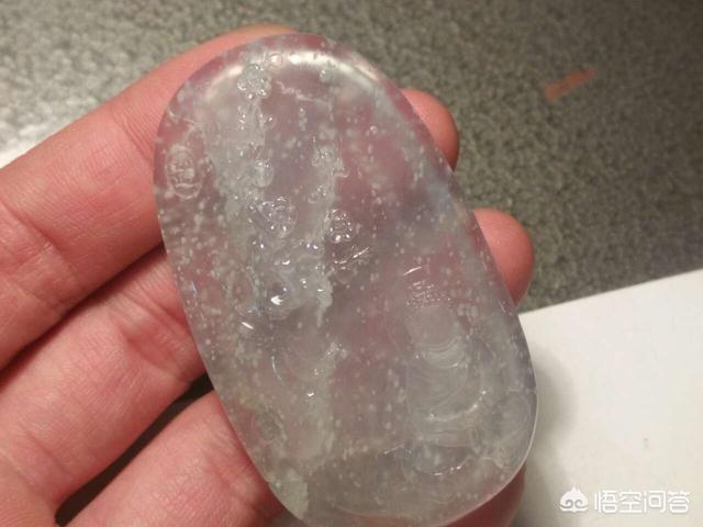 灯光下翡翠的棉絮图片,翡翠里的雪花棉是怎么回事？