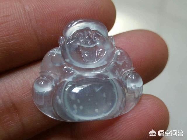 灯光下翡翠的棉絮图片,翡翠里的雪花棉是怎么回事？