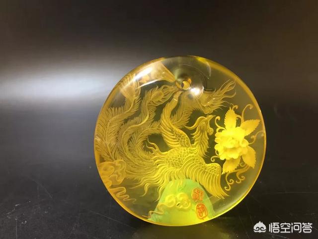 天然琥珀蜜蜡,天然琥珀吊坠阴雕是真的吗？