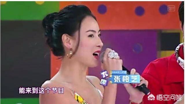 张柏芝被虐照:在梅艳芳葬礼上，为什么张柏芝笑？笑的目的是什么？