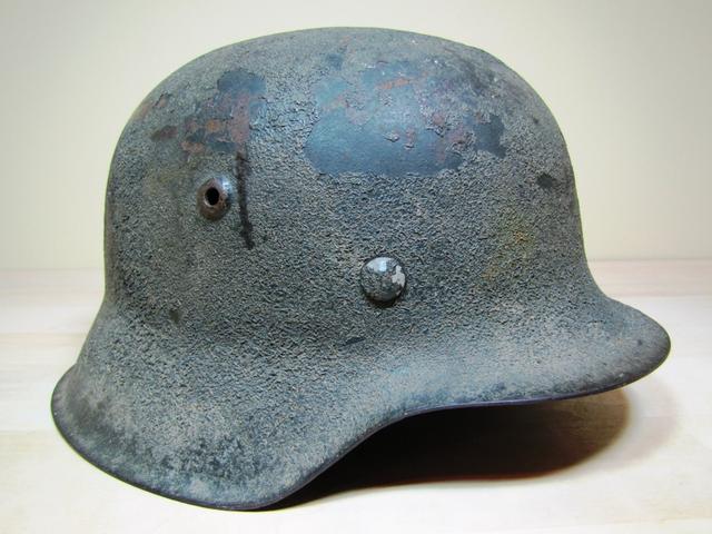 头条问答 - 德国二战头盔有织网吗?还有其他什么样式的伪装头盔?