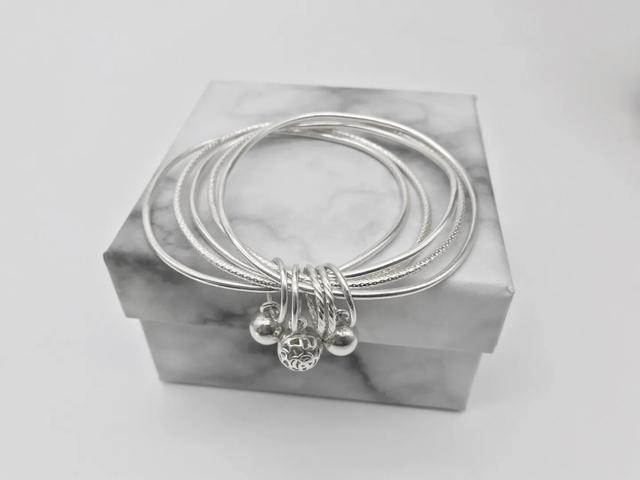 几十块钱的岫玉是真的吗,商场里的玉100多的都是真的吗？