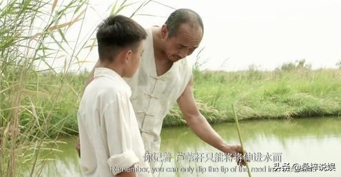 李岷城:电影《百鸟朝凤》焦三爷去世后天鸣吹的唢呐上为何绑着红布？