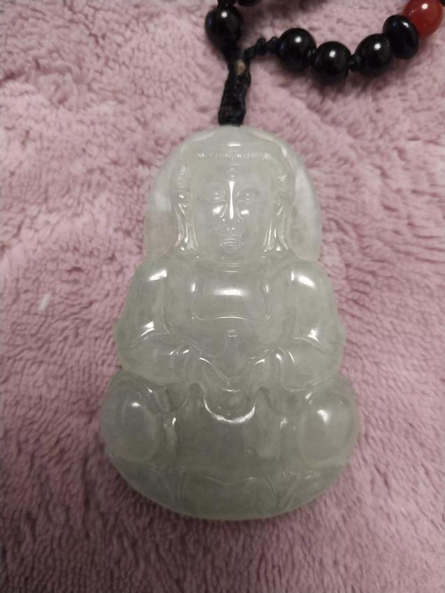 翡翠观音的价格是多少,A货翡翠店价65万观音应该多少可成交？