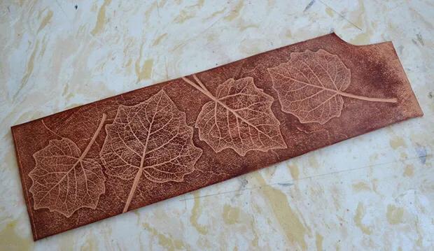 玉石真皮假皮怎么区分,在购买真皮皮衣时，如何识别皮衣真伪？