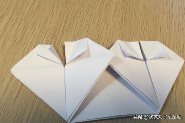 4,反过来,再对折3,将四个角往中心线折2,对折后打开工具/原料长方形纸