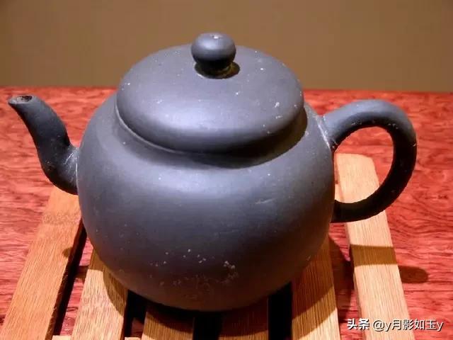 这是清代紫砂盖子吗是老的？